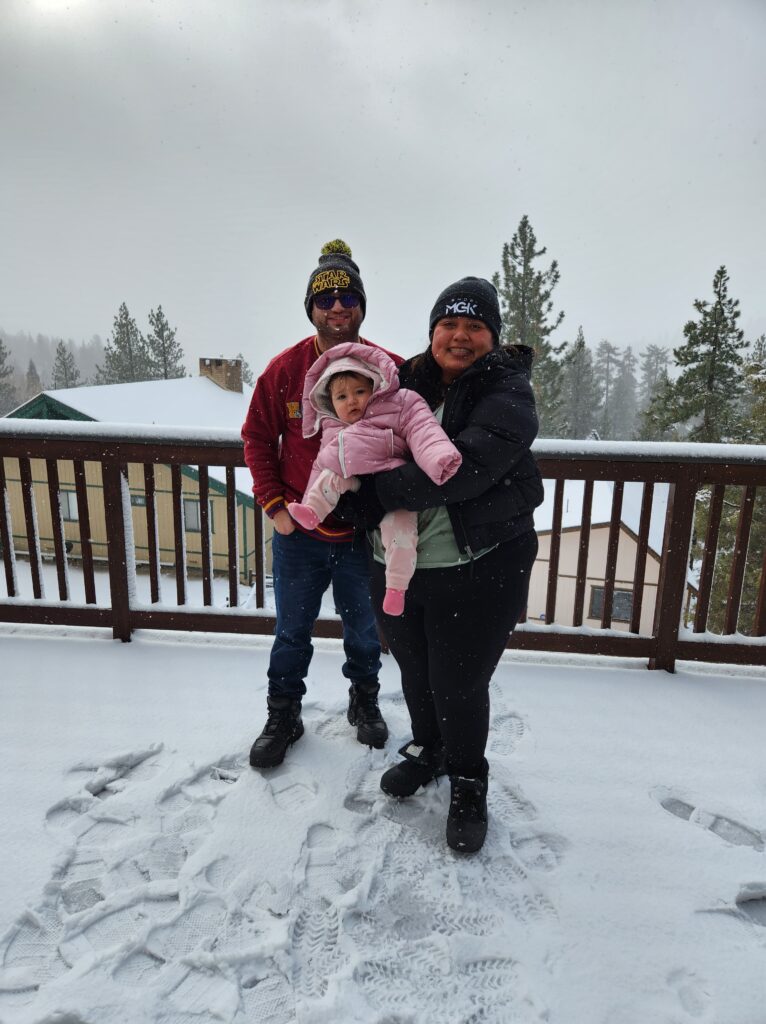 C. D. Baron with his wife and daughter in the snow